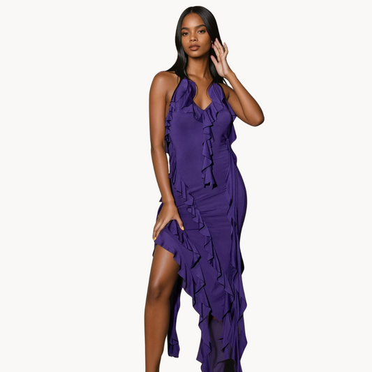 Purple halter midi dress with cascading ruffle details and asymmetrical hem – elegant cocktail dress or evening party outfit for women.