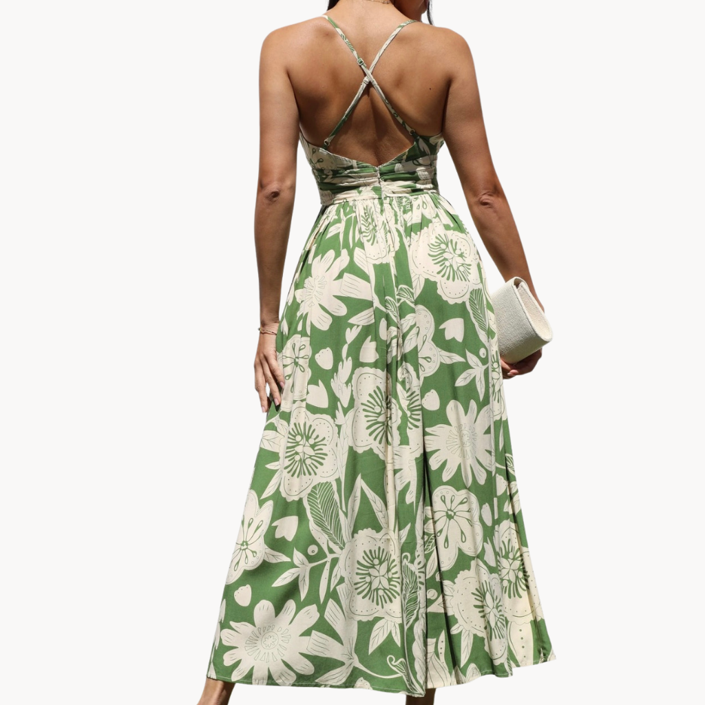 Green floral print maxi dress with plunging neckline and thigh-high slit – breezy vacation dress or tropical wedding guest outfit for women.